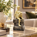 Abstract Reader on Books Decorative Sculpture – Gold & Black